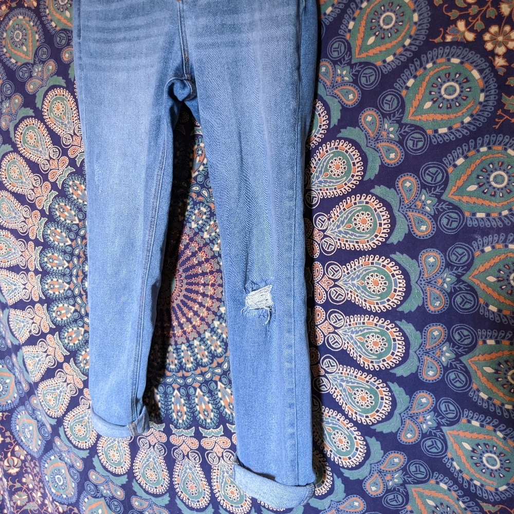 High waisted distressed jeans